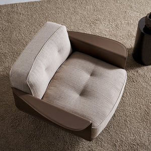 Display Avenor armchair by Beacon, featuring plush upholstery and modern design, shown as a display item in a showroom setting.