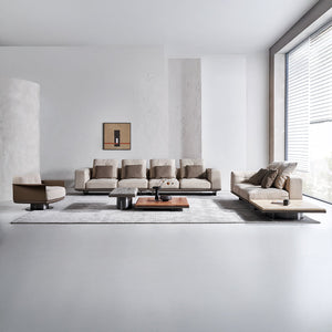 Display of the Avenor armchair by BEACON, featuring plush fabric upholstery and a modern design.
