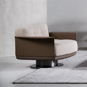 A beige Avenor armchair by Beacon, displayed as an attractive and comfortable lounge chair in a modern living space.