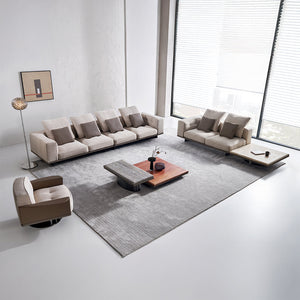 Display Avenor armchair by BEACON, showcasing a modern, plush armchair with fabric upholstery and sleek design.