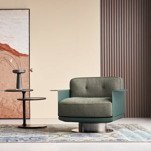 Green Avenor armchair by BEACON, featuring a comfortable fabric design and modern armchair style.