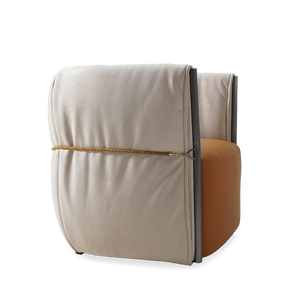 Comfortable BEACON Baxter armchair with plush upholstery and modern design, perfect for living rooms or cozy spaces.
