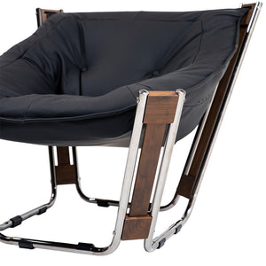 Black Cocoon Lounge Chair by BEACON with a cozy, rounded design perfect for relaxing, modern home decor.