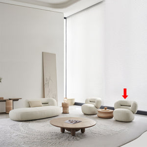BEACON Ferrara armchair AMCJ-DY6057 with plush fabric upholstery and curved armrests, modern design for living room decor.
