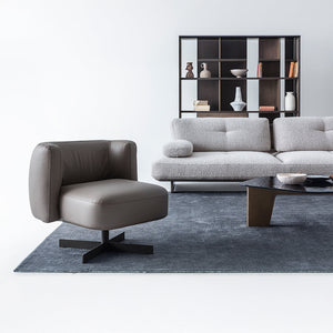 HOMAGE KOLTUK Foresta armchair with plush fabric upholstery and wooden legs, modern design for living room seating.