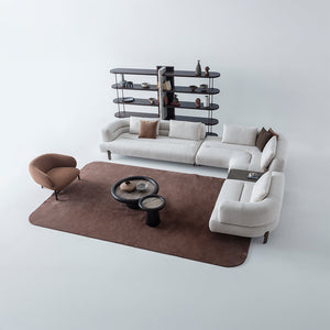 HOMAGE KOLTUK Freda armchair with plush fabric upholstery and wooden legs, modern design, seen from front view.