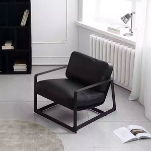 Black Lille Lounge Chair LC008 by BEACON, with sleek modern design and comfortable upholstered seating.
