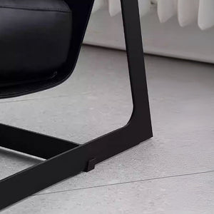Black Lille Lounge Chair LC008 from BEACON featuring a modern, minimalist design with cushioned upholstery and sleek legs.
