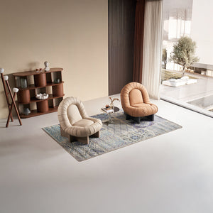 Orange BEACON Lounge Chair LC092 with curved armrests and plush cushioning, perfect for modern living rooms.