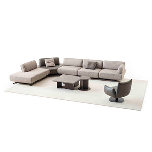 YOL LIVING MILA Amara armchair with plush fabric upholstery and curved armrests, modern design for living room decor.