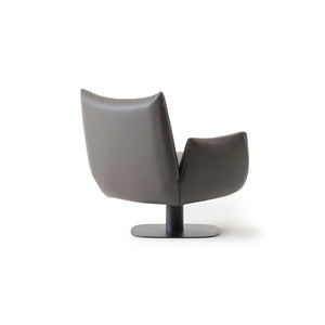 YOL LIVING MILA Amara armchair with plush fabric upholstery and modern design, shown in a cozy living room setting.