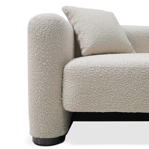 BEACON Soren lounge armchair with plush upholstery and modern design, perfect for a contemporary living space.