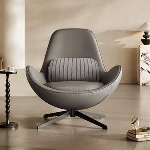 Beige Vigo swivel lounge chair by BEACON with cushioned seat and modern design, shown from a side angle.