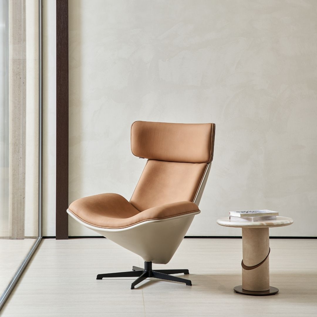 BEACON Bolo Lounge Chair armchair with modern design, plush cushioning, and sleek metal legs, perfect for contemporary living rooms.