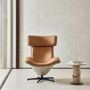 BEACON Bolo lounge chair armchair with modern design and plush upholstery, shown in a stylish living room setting.