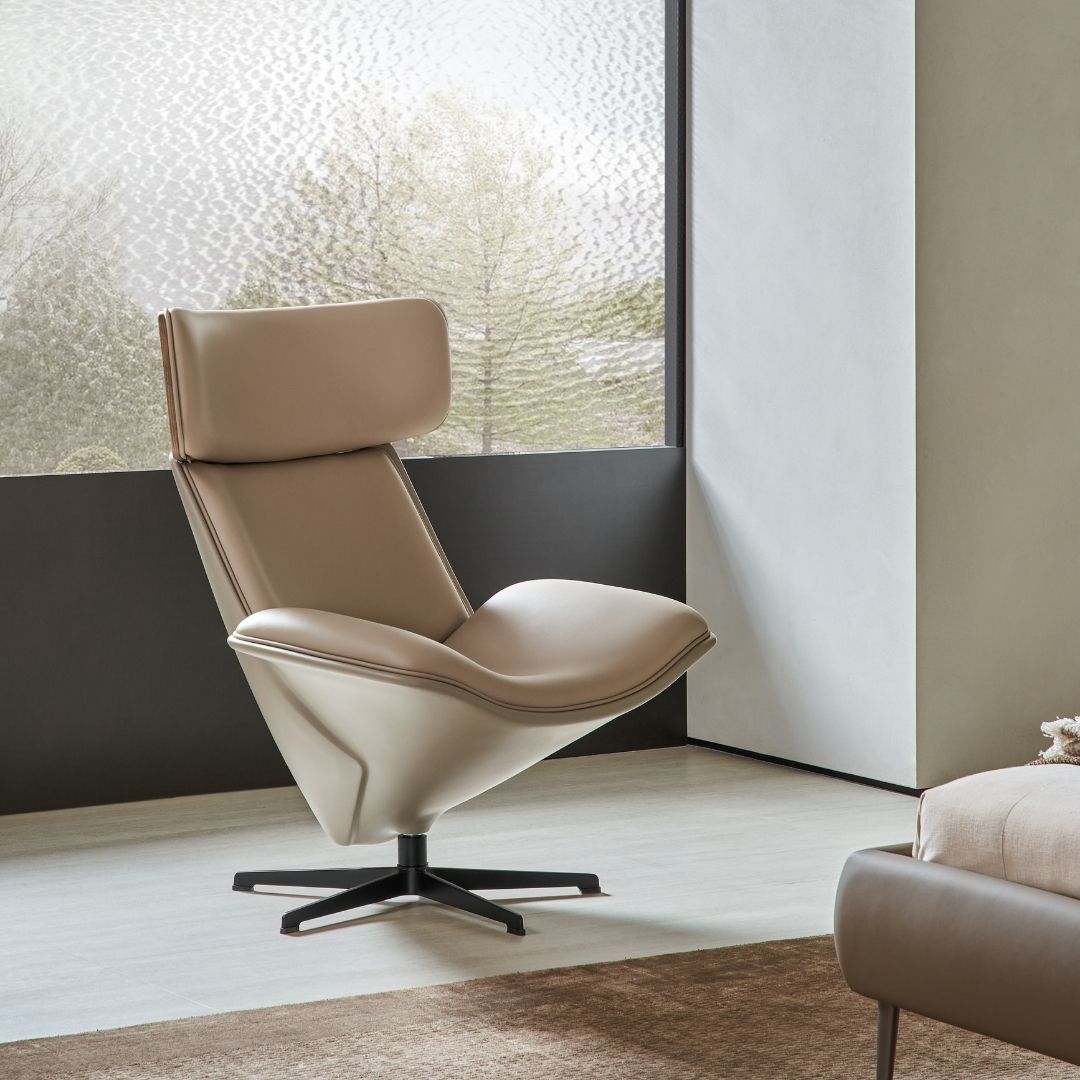 BEACON Bolo lounge chair armchair with plush upholstery and modern design, shown in a stylish living room setting.