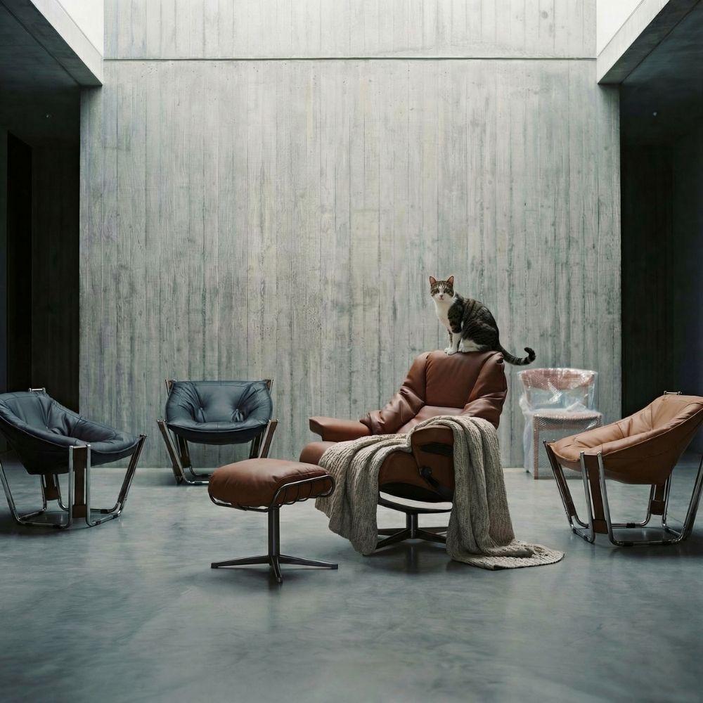 Brown Cocoon Lounge Chair by BEACON, modern rounded seat with plush upholstery and supportive armrests, stylish and comfortable.