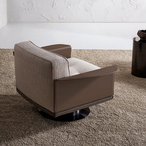 A beige Avenor armchair by Beacon, displayed as a showroom item with plush fabric and modern design.