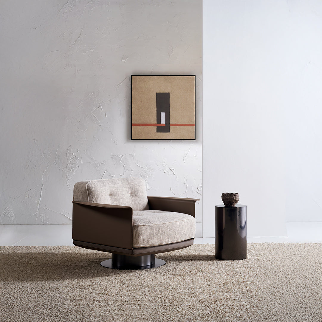 Display image of the Avenor armchair by Beacon, showcasing its stylish design and comfortable upholstered fabric.