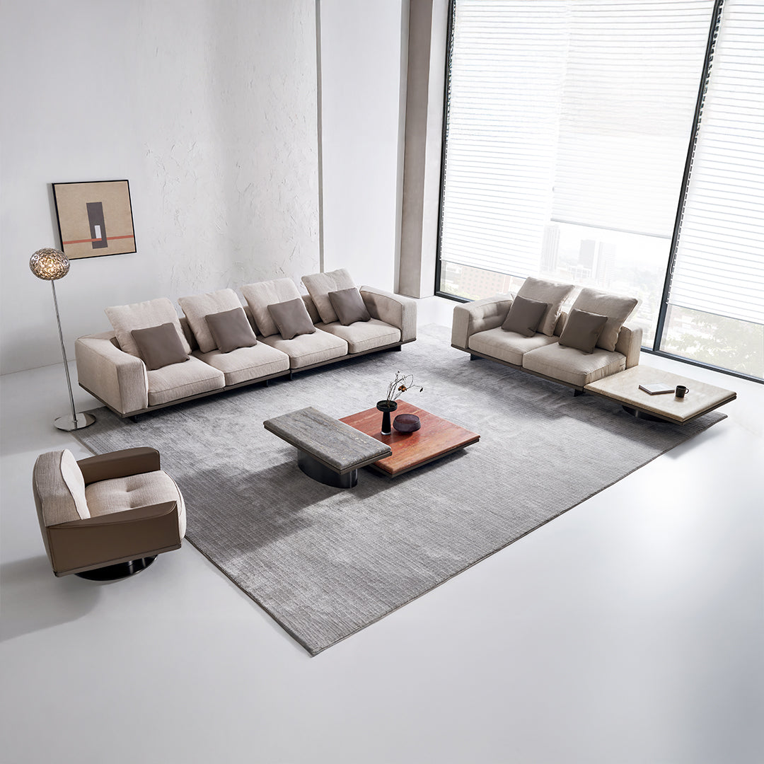 Display Avenor armchair by BEACON, showcasing a modern, plush armchair with fabric upholstery and sleek design.