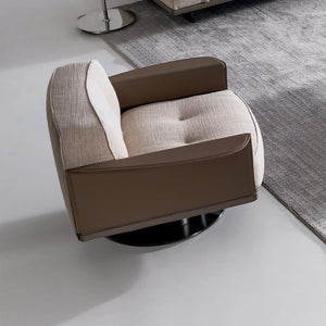 A beige BEACON Avenor armchair display model with plush fabric and rounded armrests, showcasing modern living room style.