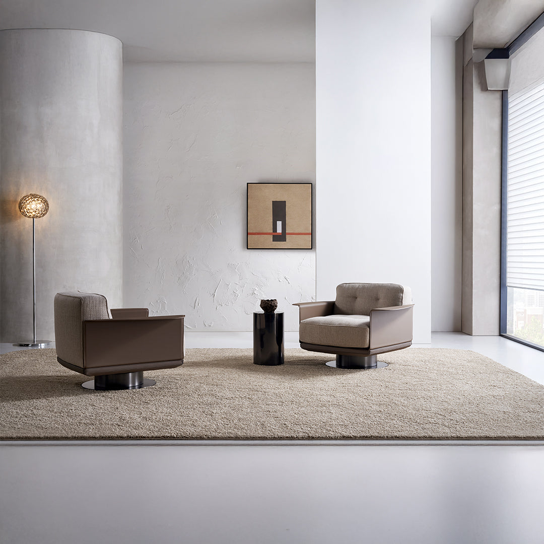 Display image of the Avenor armchair by Beacon, showcasing its modern design and comfortable fabric upholstery.