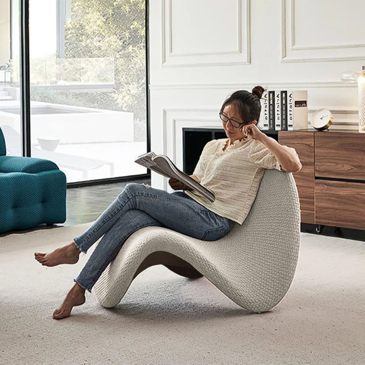 Beige Worm Lounge Chair by BEACON, modern beige lounge chair with smooth curves, ideal for relaxing and casual seating.