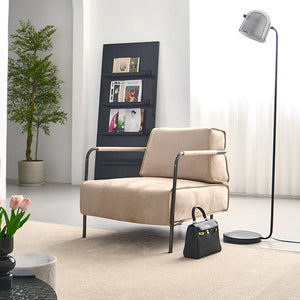 BEACON Caesar lounge chair with black iron rack, modern design, comfortable seating, and sleek black metal frame.