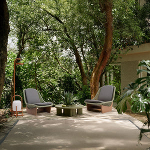 Beacon Clogs lounge chair with seat and back cushions, modern armchair featuring plush cushions and sleek design.
