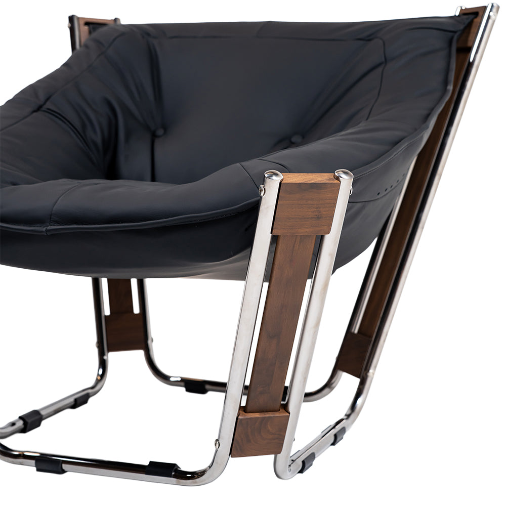 Black Cocoon Lounge Chair by BEACON with a cozy, rounded design perfect for relaxing, modern home decor.