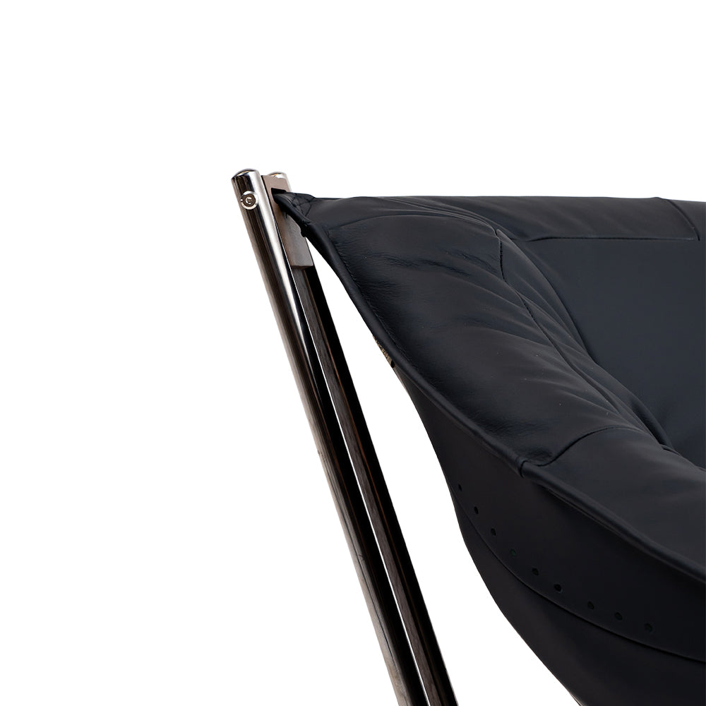 Black BEACON Cocoon Lounge Chair PS-A179 with curved, cozy design perfect for modern living spaces.