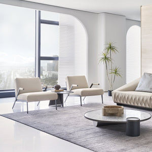 Desert beige leather lounge chair from BEACON, modern design with plush cushioning, ideal for living room relaxation.