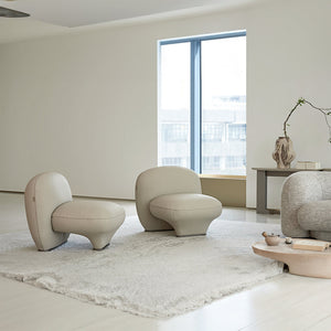 Euphoria Armchair AMCJ-DY6005 by BEACON featuring plush fabric upholstery and a modern design in a cozy living room setting.