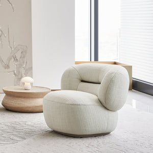 BEACON Ferrara armchair AMCJ-DY6057 with plush fabric upholstery and modern design, shown in a cozy living room setting.