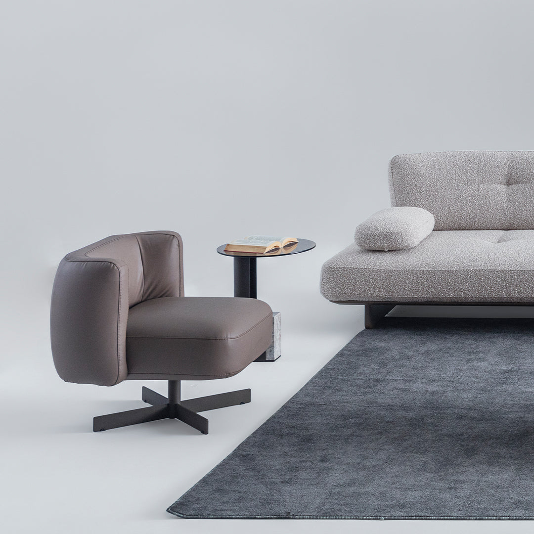HOMAGE KOLTUK Foresta armchair with plush fabric upholstery, modern design, and wooden legs.