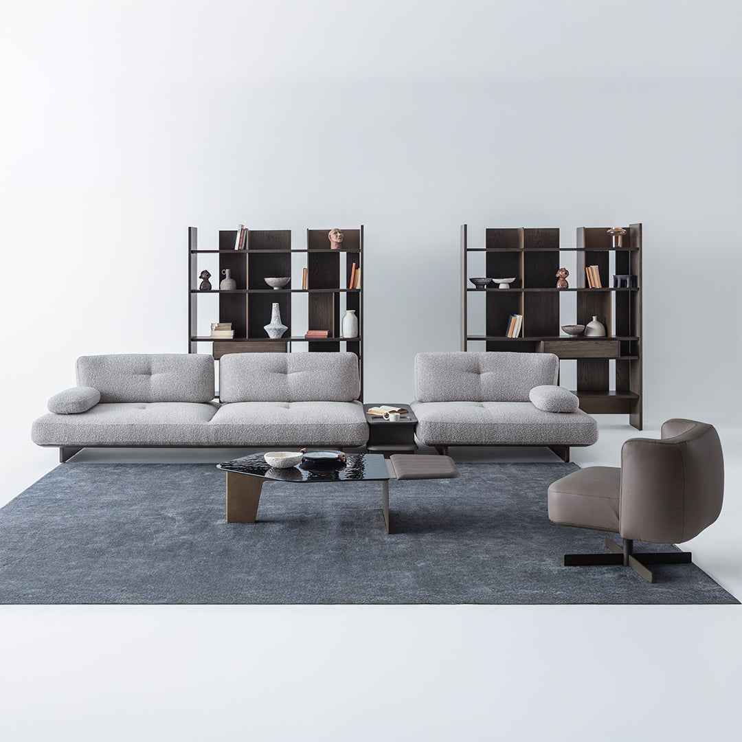 Foresta Armchair by HOMAGE KOLTUK featuring plush fabric, modern design, and wooden legs for stylish comfort.