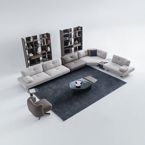 Foresta armchair by HOMAGE KOLTUK featuring a modern design, upholstered in soft fabric with wooden legs.