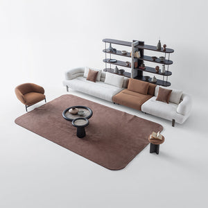 HOMAGE KOLTUK Freda armchair with plush fabric upholstery and modern design, shown in a cozy living room setting.