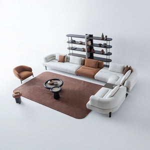 Freda armchair by HOMAGE KOLTUK featuring a modern design with plush upholstery and wooden legs, ideal for living room seating.