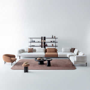 HOMAGE KOLTUK Freda armchair with plush fabric upholstery and modern design, showcasing its comfortable and stylish seating.