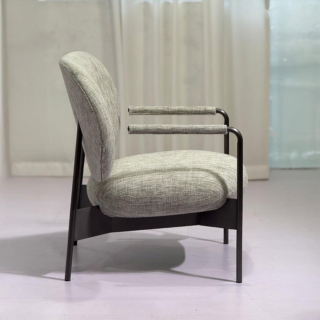 BEACON Haven Armchair PS-A154 with plush fabric upholstery and modern design, shown in a cozy living room setting.