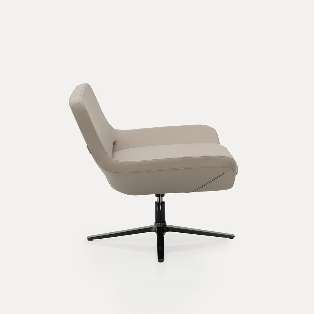 Beige BEACON lounge chair with modern design, cushioned seat and backrest, ideal for relaxation in living spaces.