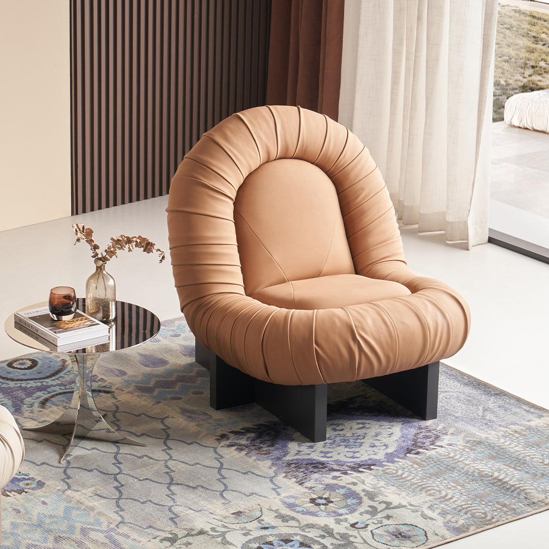 Orange BEACON Lounge Chair LC092 with cushioned seat and modern design, perfect for relaxing living room or lounge space.
