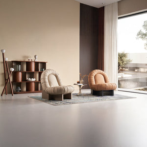 Orange BEACON Lounge Chair LC092 with sleek design and cushioned seat, ideal for relaxing and modern living spaces.