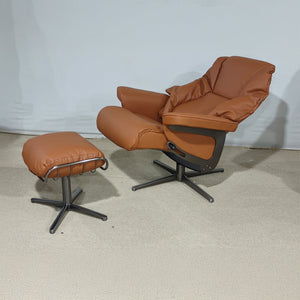 BEACON Meridian lounge chair with matching caramel leather ottoman, stylish and comfortable seating for living room decor