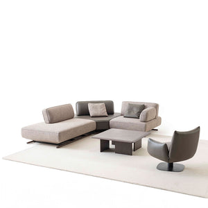 YOL LIVING Mila Amara armchair with plush fabric upholstery and wooden legs, modern design, in a cozy living room setting.