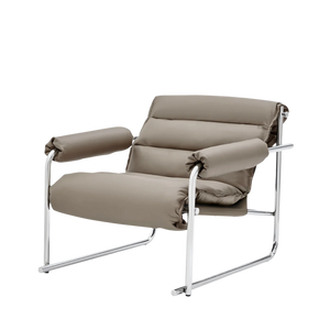 Beige Murcia leather lounge chair by BEACON with plush cushioning and modern design, perfect for living room relaxation.