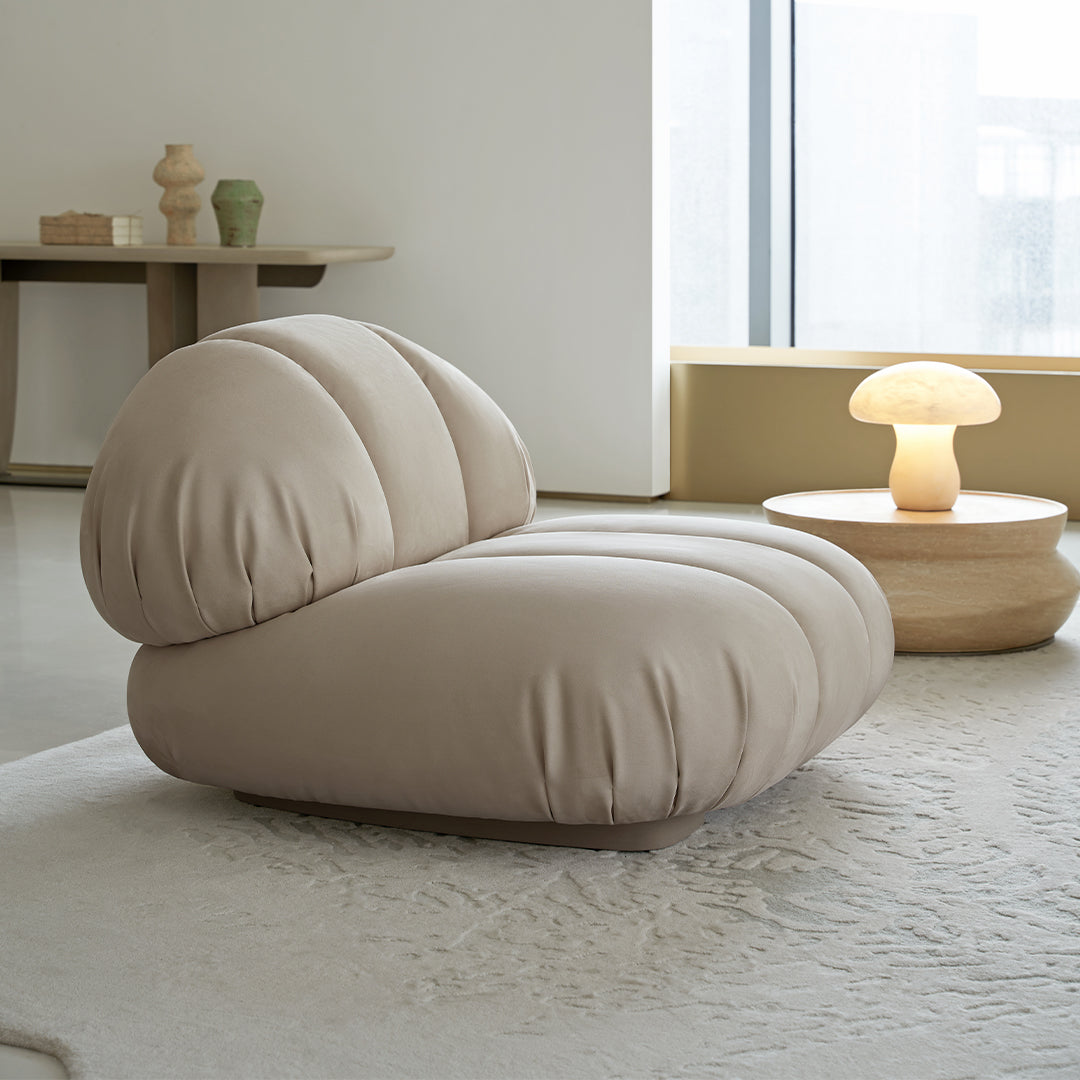 BEACON Nimbus Armchair AMCJ-DY6021 with plush fabric upholstery and modern design, shown in a stylish living room setting.