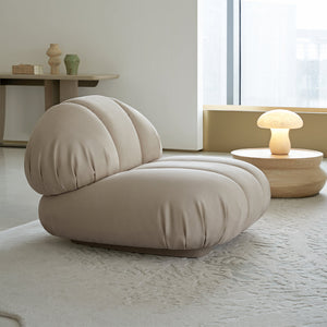 BEACON Nimbus Armchair AMCJ-DY6021 with plush fabric upholstery and modern design, shown in a stylish living room setting.