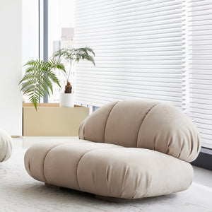 BEACON Nimbus Armchair AMCJ-DY6021, modern armchair with plush upholstery and sleek design, in a cozy living room setting.